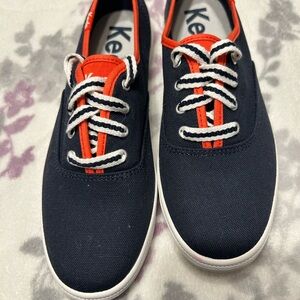 Brand new. Keds Navy and Red Sneakers